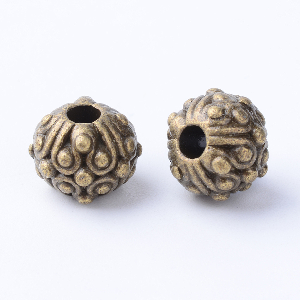 PandaHall Tibetan Style Alloy Beads, Round with Flower, Cadmium Free & Nickel Free & Lead Free, Antique Bronze, 11x8~8.5mm, Hole: 3mm; about...