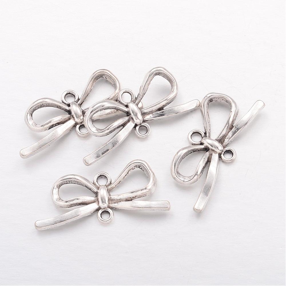 PandaHall Tibetan Style Connectors, Lead Free, Bowknot, Antique Silver, 34x14x4mm, Hole: 2mm Alloy Bowknot