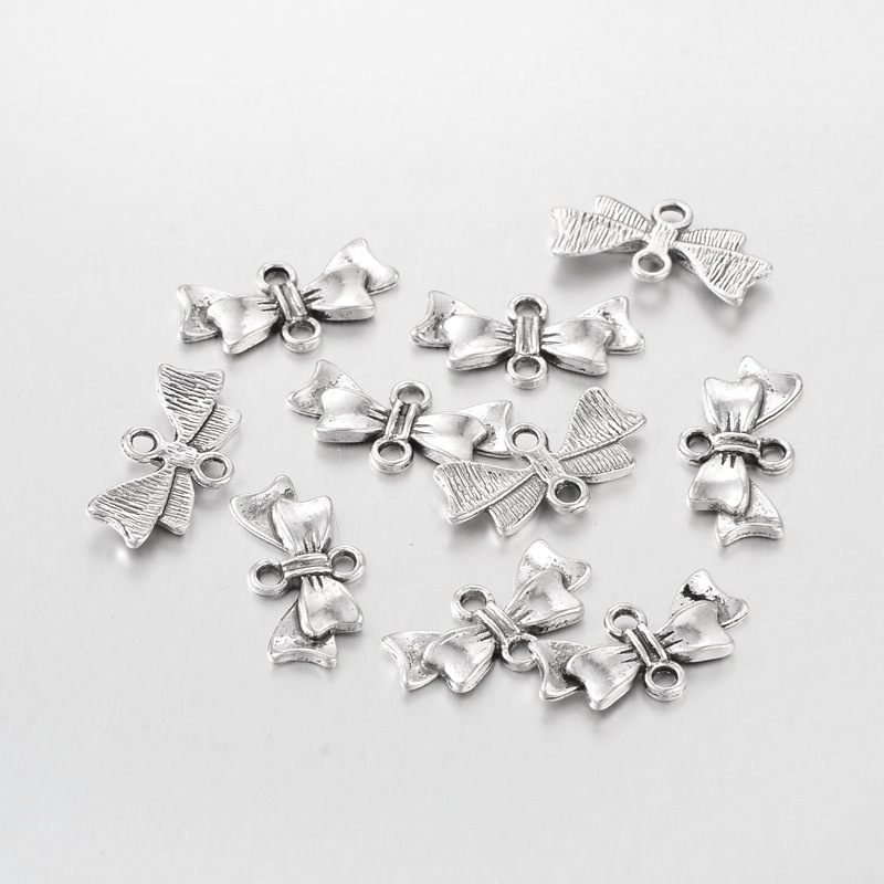 PandaHall Bowknot Alloy Links, Lead Free & Cadmium Free & Nickel Free, Antique Silver, 20mm long, 10mm wide, 3mm thick, hole: 2mm Alloy...