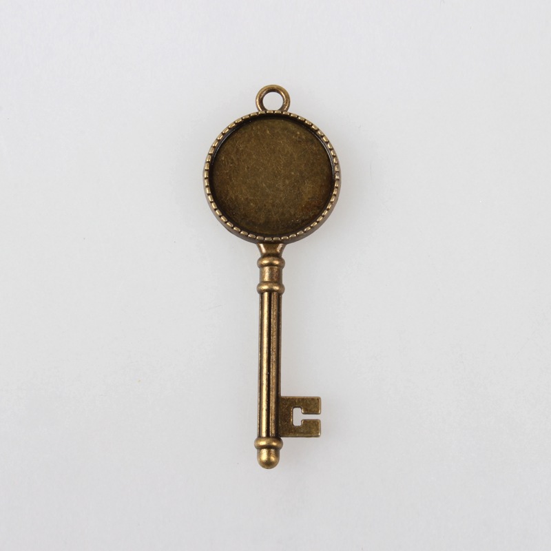 PandaHall Alloy Carved Flower Double Sided Skeleton Key Pendant Cabochon Bezel Settings, Nickel Free, Antique Bronze, Tray: 20mm; 62x22x4mm...