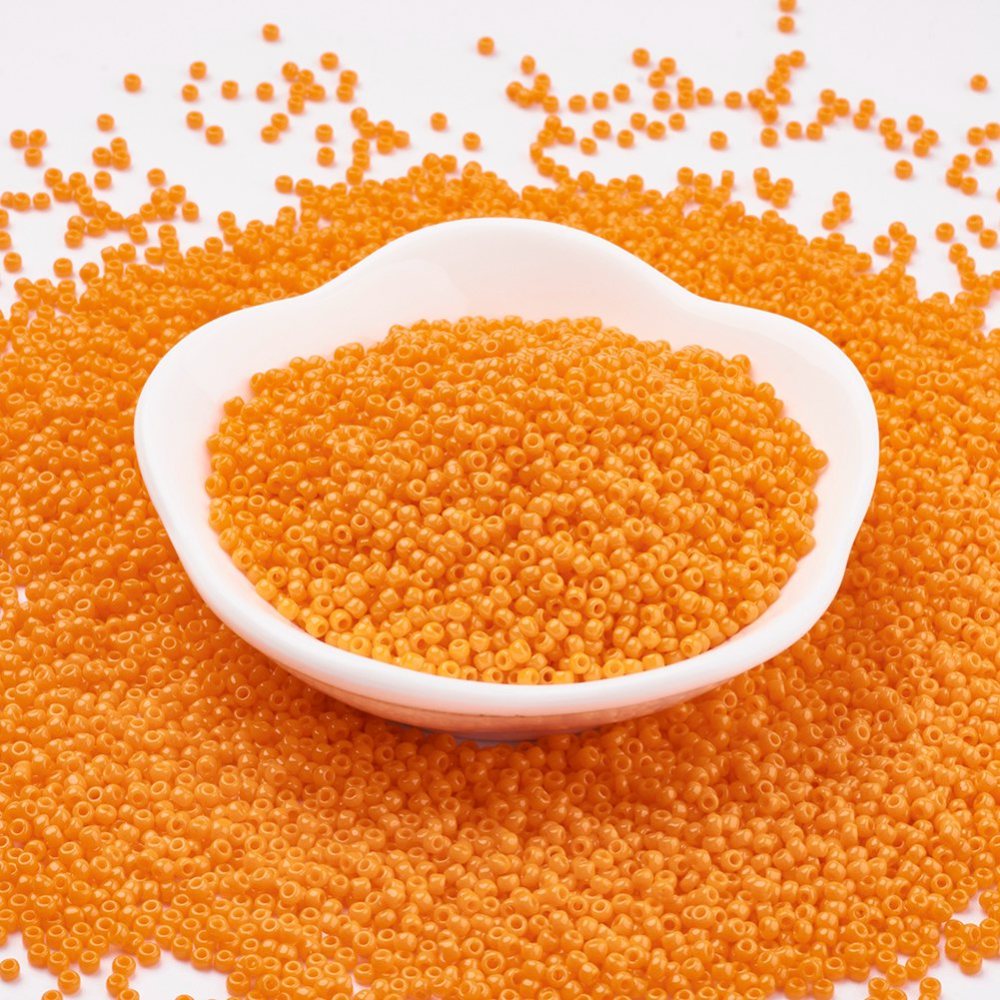 PandaHall TOHO&reg Japan Import Glass Round Seed Beads, 11/0 Opaque, Orange, 2x1.5mm, Hole: 0.5mm; about 933pcs/10g Glass Orange