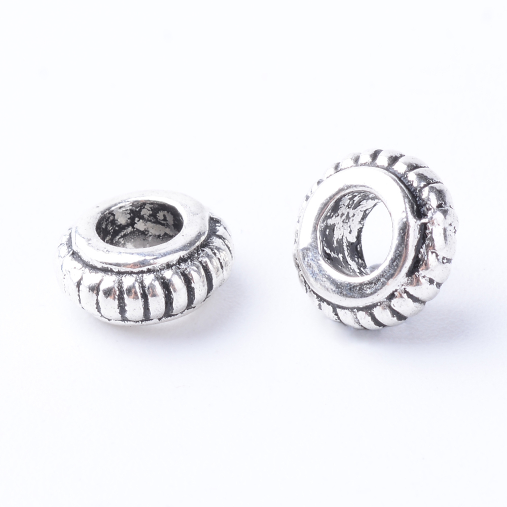 PandaHall Tibetan Style Alloy Bead Spacers, Rondelle, Cadmium Free & Nickel Free & Lead Free, Antique Silver, 7.5x3~4mm, Hole: 3mm; about...