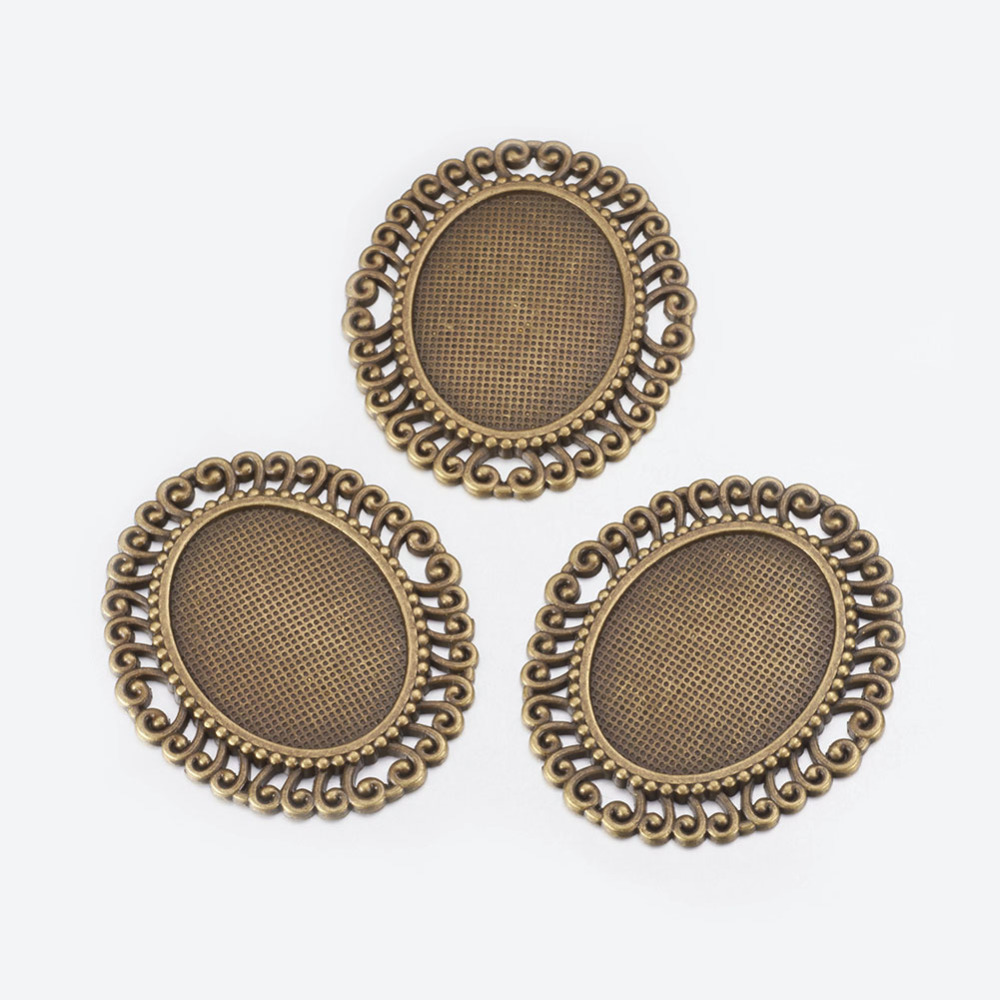 PandaHall Tibetan Style Cabochon Connector Setting, Oval, Antique Bronze, Lead Free and Cadmium Free, 55x47x2mm, Hole: 6mm; Tray: 28x37mm...