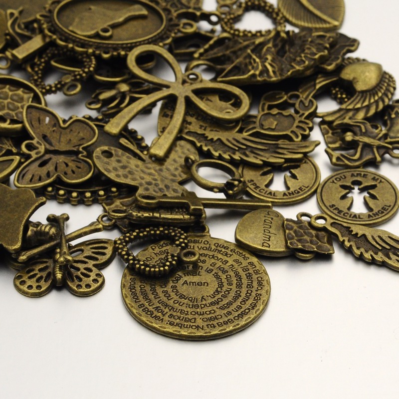 PandaHall Tibetan Style Alloy Findings, Nickel Free, Mixed Shape, Antique Bronze, Antique Bronze, 7~46x6~31x1~12.5mm, Hole: 1~4mm Alloy