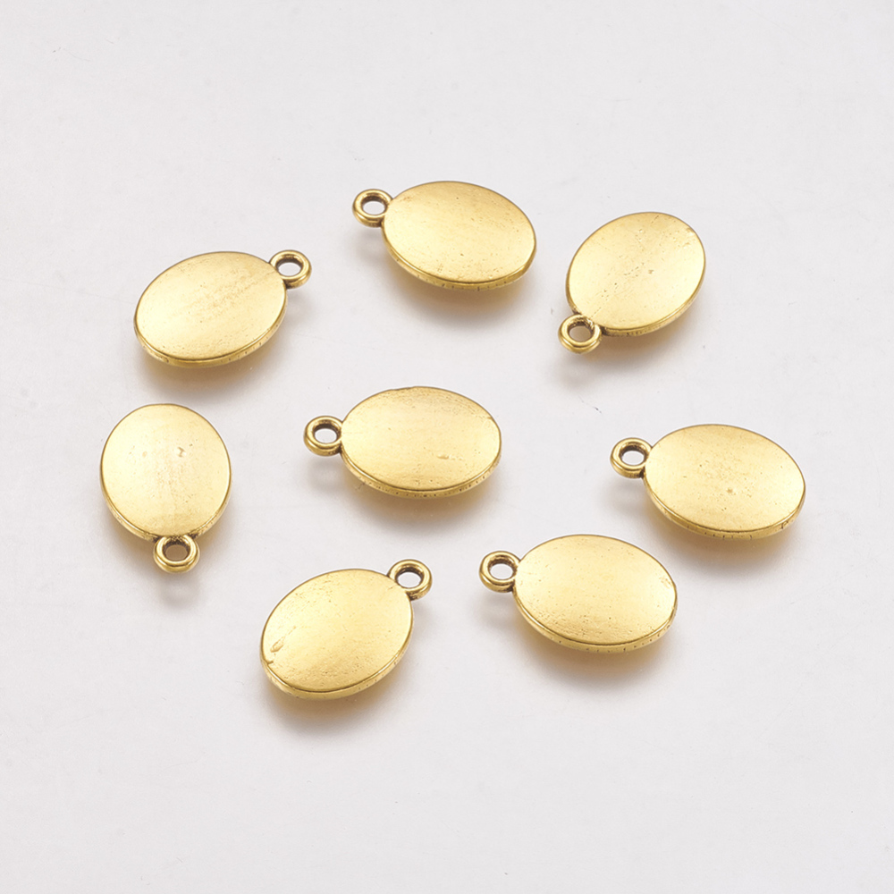 PandaHall Tibetan Style Alloy Blank Stamping Tag Charms Pendants, Lead Free & Nickel Free, Oval, Antique Golden, 15x10x2mm,  Hole: 2mm Alloy...