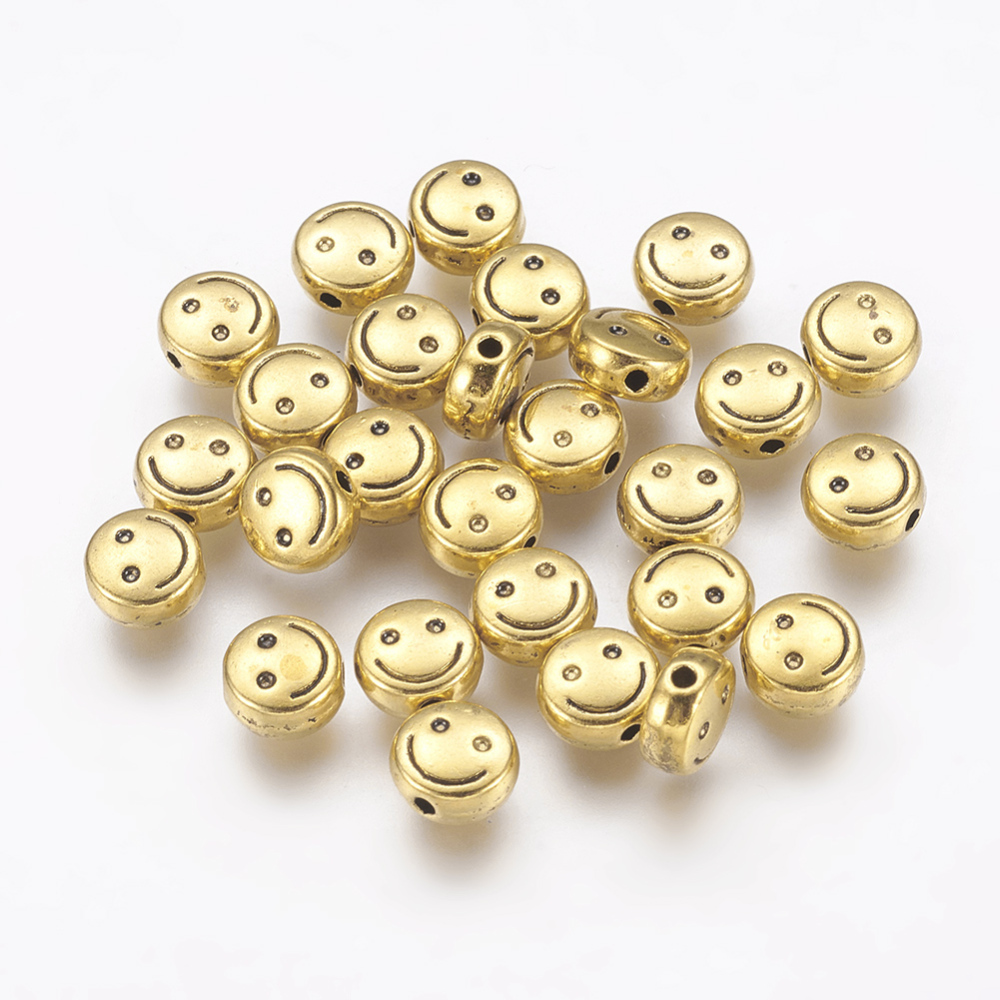 PandaHall Tibetan Style Flat Round Carved Smiling Face Beads, Lead Free & Cadmium Free, Antique Golden, 6x3mm, Hole: 1mm Alloy Flat Round