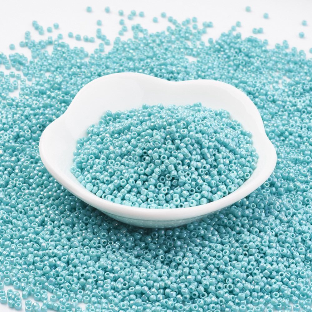 PandaHall TOHO&reg Japan Import Glass Round Seed Beads, 11/0 Opaque-Rainbow, AB Color, Turquoise, 2x1.5mm, Hole: 0.5mm; about 933pcs/10g...