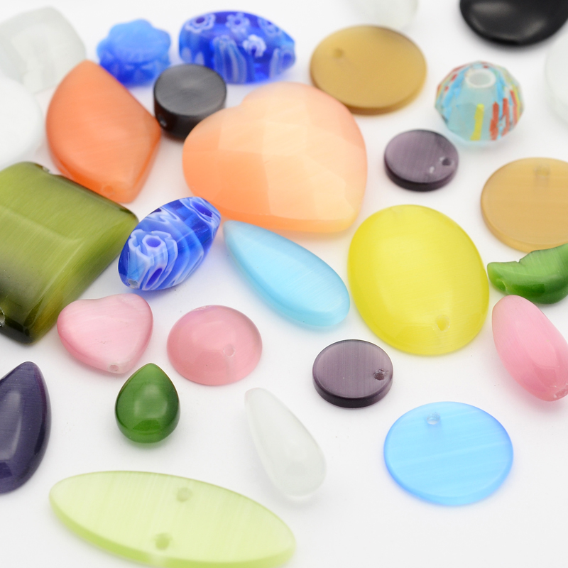 PandaHall Mixed Cat Eye Beads/Pendants, Mixed Color, 5~36x5~25x2~8mm, Hole: 0.5~5mm; about 128pcs/200g Glass Others Multicolor